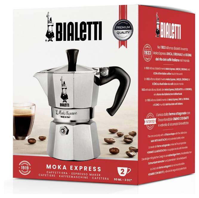 Eine rote Box mit einem Bild einer silbernen Bialetti Moka Express Kaffeemaschine, einer Tasse und Kaffeebohnen. Der Text betont ihre Qualität und Geschichte.