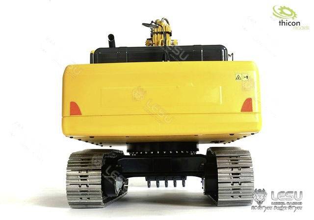 Ein gelbes Modell eines Baggers mit Gummiketten, frontal gezeigt. Markenlogos 'Thicon' und 'LESU' oben rechts und unten links.