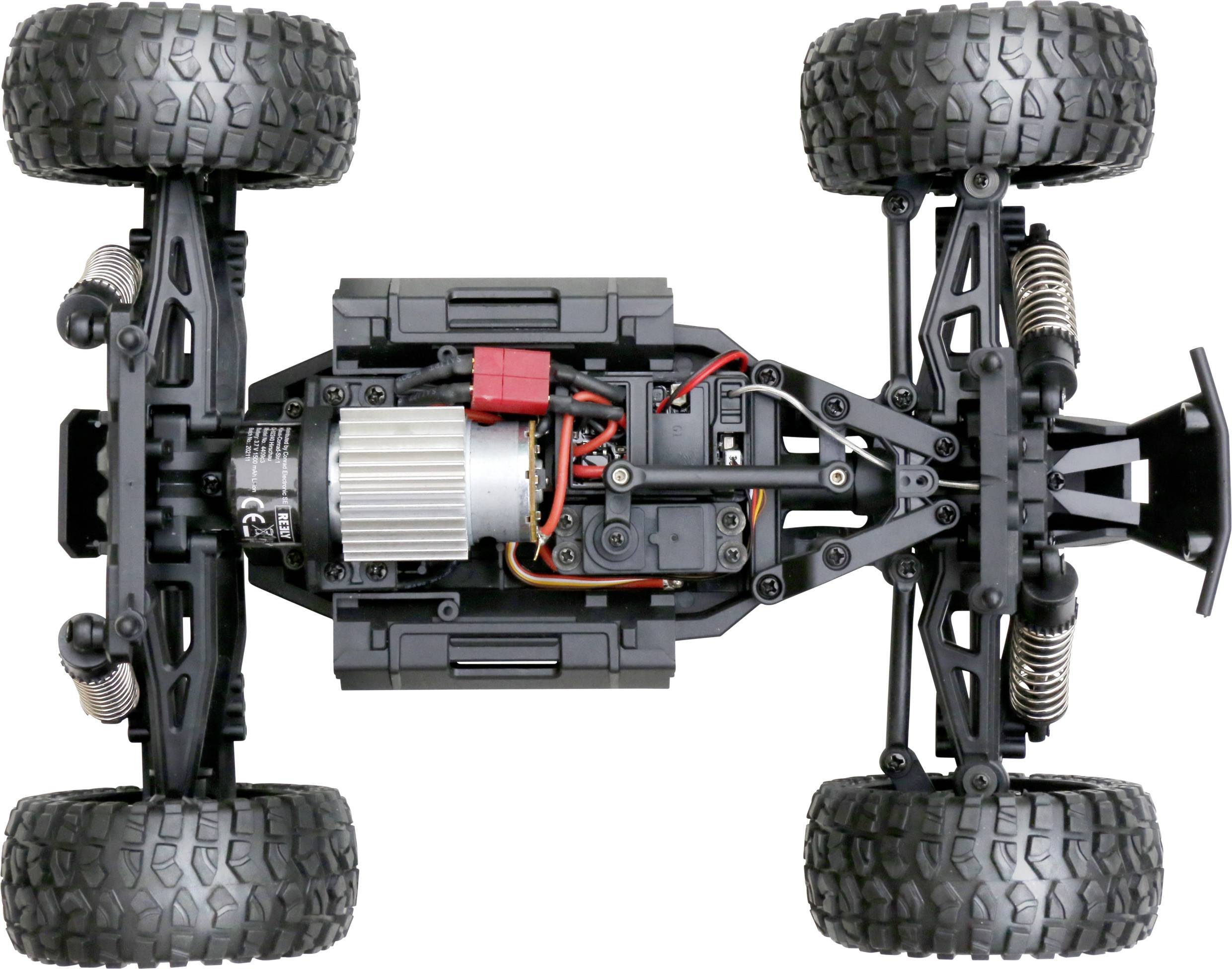Obere Ansicht eines ferngesteuerten Autos ohne Karosserie, zeigt Motor, Kabel, Federung und große, profilierte Reifen.