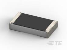 Ein rechteckiges, flaches elektronisches Bauteil mit dunkler Oberseite und hellen Kanten, möglicherweise ein Chip oder Sensor.