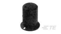 Ein schwarzer, zylindrischer Knopf mit geriffelter Oberfläche auf einer runden Basis, möglicherweise ein Drehknopf für ein Gerät.