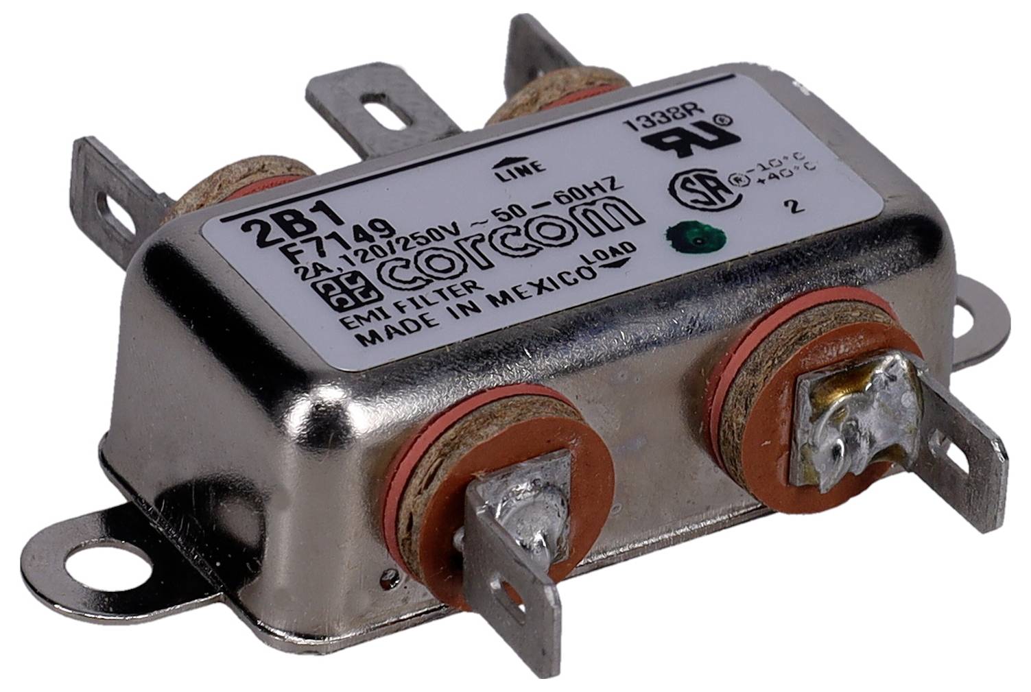 'Corcom 2B1 EMI-Filter', bewertung 2A bei 120/250V, 50-60Hz. Metallgehäuse mit zwei Stiften und zwei Montageflansche, gekennzeichnet mit 'MADE IN MEXICO'.