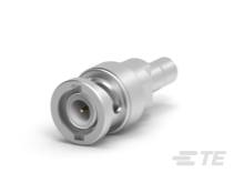 Ein kleiner, silberner Stecker mit zylindrischer Form und einem zentralen Kontaktpunkt, vermutlich für elektronische Anwendungen.