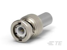 Metallischer Koaxialstecker mit zylindrischem Design und geriffeltem Schraubverschluss. Geeignet für elektrische Verbindungen.