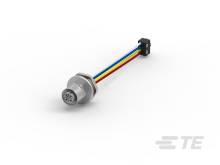 Grauer elektrischer Sensor mit mehreren Drähten in Rot, Gelb, Blau und Schwarz, die in einem kleinen Steckverbinder enden.