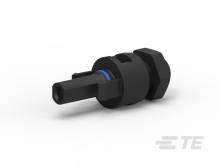 Schwarze, zylindrische Kunststoffverbindung mit zwei ineinandergreifenden Teilen, auf weißem Hintergrund.