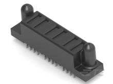 Elektronischer Chip mit mehreren Pins und zwei abgerundeten Vertiefungen auf einem weißen Hintergrund.