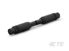 Ein schwarzer zylindrischer Adapter mit mehreren Anschlüssen. Das Gerät ist länglich und könnte für technische oder elektrische Verbindungen genutzt werden.
