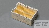 Ein rechteckiger elektronischer Steckverbinder mit mehreren gelben Pins, auf einer grauen Oberfläche.