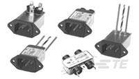 Verschiedene elektronische Bauteile in symmetrischer Anordnung; jedes Bauteil hat schwarze Anschlüsse und ein etikettiertes Gehäuse.