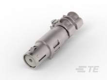 Ein zylinderförmiger technischer Bauteil, vermutlich ein Steckverbinder oder Adapter, in grauer Farbe auf weißem Hintergrund.