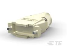 Ein cremefarbener, rechteckiger Adapterstecker mit metallischen Pins, möglicherweise für eine elektronische Verbindung oder ein Kabel.