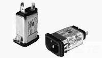 Zwei quadratische elektronische Bauteile in identischer Form, mit Steckern und Kennzeichnungen auf der Oberfläche, im Fokus.
