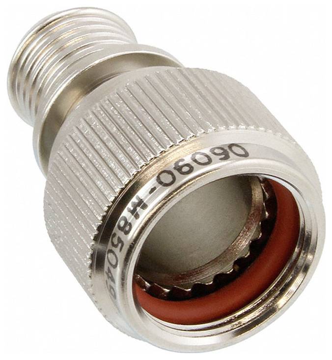Ein metallischer koaxialer Adapter mit gewindeltem Ende und glattgläubigem zylindrischem Steckverbinder, mit eingraviertem Text „06090-H85049