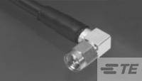Nahaufnahme eines silbernen Sechskant-Steckers mit schwarzem Kabel, möglicherweise ein Koaxialkabel für elektronische Verbindungen.
