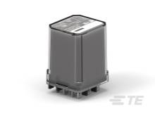 Elektronisches Bauteil mit rechteckiger Form, oft für Schaltungen verwendet. Es zeigt technische Details und Anschlussstifte auf der Unterseite.