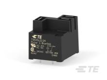 Ein rechteckiges elektrisches Relais mit Anschlussstiften. Markierungen auf der Oberseite zeigen Herstellernamen und technische Spezifikationen.