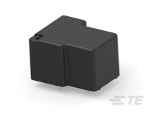 Ein schwarzes, rechteckiges elektronisches Bauteil mit zwei Metallstiften. Möglicherweise ein Relais oder ein ähnliches Gerät.