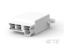 Ein quadratisches, weißes Kunststoffgehäuse mit mehreren Steckern an der Vorderseite, möglicherweise ein elektrisches oder technisches Gerät.