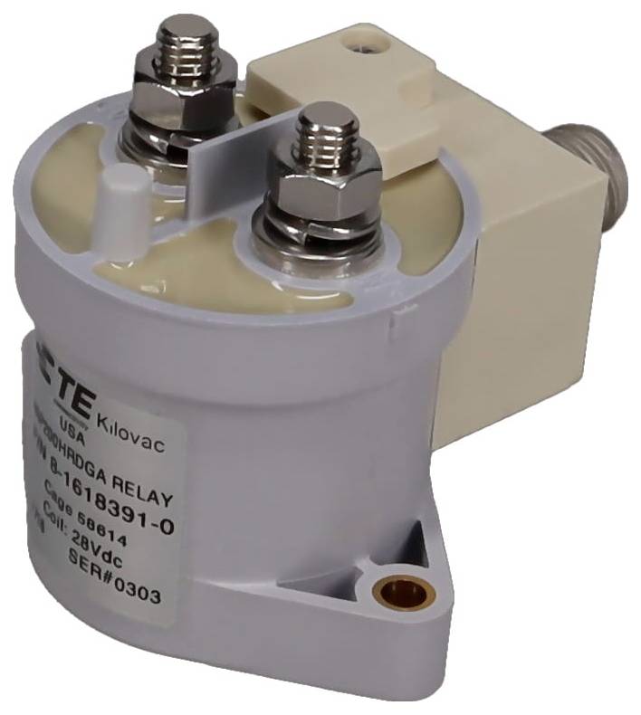 Ein zylindrisches, graues elektrisches Relais mit zwei Metallklemmen oben, beschriftet mit 'TE USA Kilovac', das zur Steuerung von Stromkreisen verwendet wird.