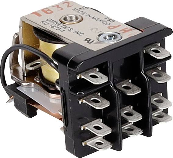 Ein kleines elektrisches Relais mit mehreren Metallstiften, auf der Oberseite mit '1832' und 'Made in Mexico' beschriftet, das zum Schalten von Stromkreisen verwendet wird.