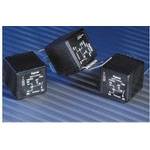 Drei schwarze elektronische Komponenten mit weißen Schaltkreissymbolen, die auf einer blau gestrichelten Oberfläche liegen.