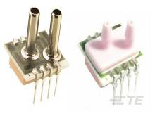 Zwei elektronische Drucksensoren, einer mit Metallanschlüssen, der andere mit Plastikanschlüssen, beide mit mehreren Stiften.