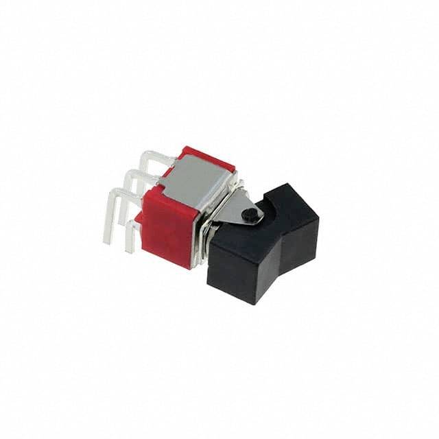 Ein roter und schwarzer elektrischer Schalter mit mehreren Metallanschlüssen, in der Standardposition zum Einbau auf Platinen.