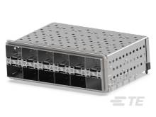 Ein rechteckiges, silbernes Metallgitter, das aussieht wie ein Steckverbinder oder Teil einer technischen Vorrichtung.