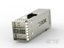 Ein metallisches elektronisches Bauteil, vermutlich ein Modul oder eine Steckkarte, teilweise hohl und mit Lüftungsschlitzen versehen.