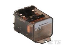 Ein transparenter elektrischer Schalter mit brauner Spule und metallischen Kontakten, vermutlich ein Relais von TE.