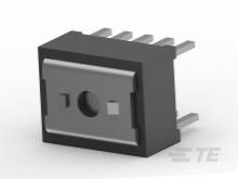 Ein schwarzer elektronischer Bauteil mit fünf Metallpins, vermutlich ein Halbleiter oder Steckverbindung, in perspektivischer Ansicht.