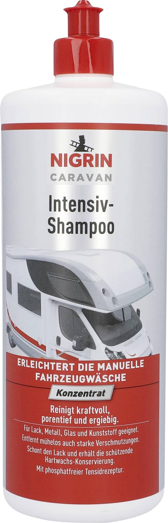 Flasche Nigrin Caravan Intensiv-Shampoo. Rotes Etikett mit weißem Wohnwagen. Text betont manuelle Fahrzeugwäsche, reinigt kraftvoll.