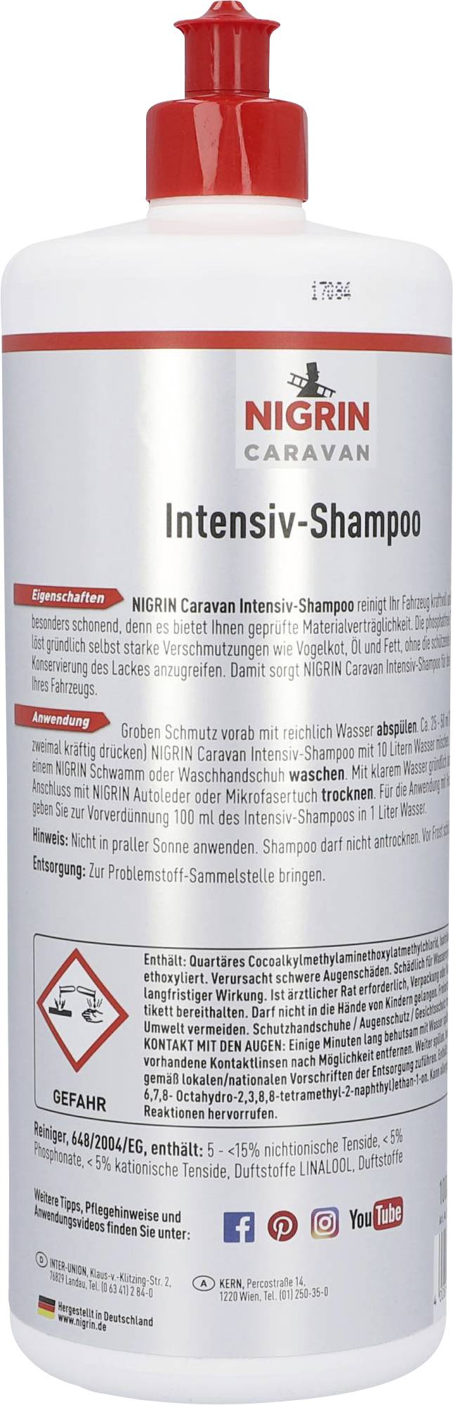 Flasche NIGRIN Caravan Intensiv-Shampoo mit rotem Verschluss, 1 Liter. Reinigt und schützt Caravan-Oberflächen.