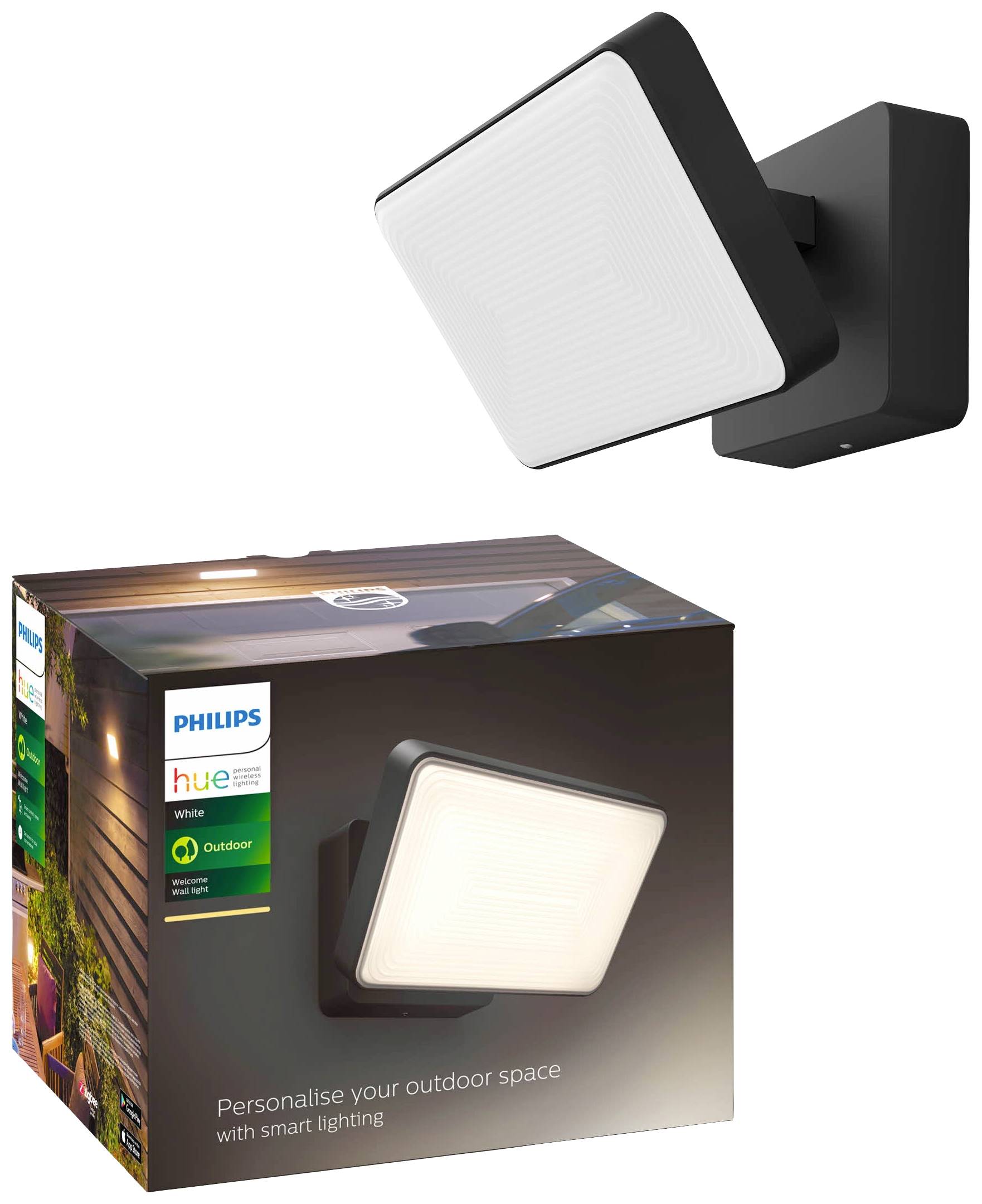 Wandleuchte und Verpackung der Philips Hue Außenleuchte. Die Leuchte hat ein quadratisches Design und bietet intelligente Beleuchtungsoptionen.