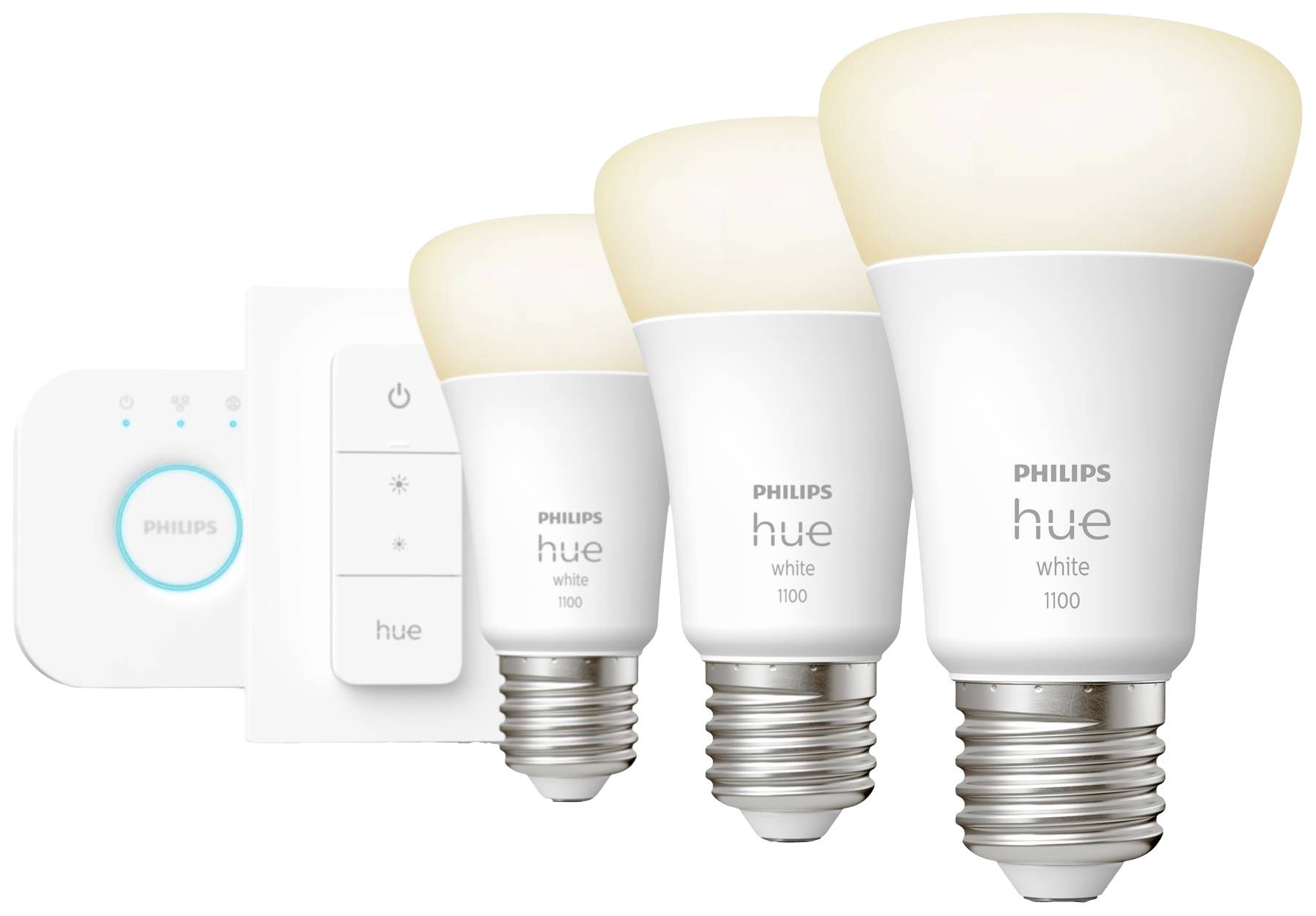 Drei Philips Hue Glühbirnen und ein Steuerungsmodul. Die Glühbirnen leuchten warmweiß und sind für smarte Lichtsteuerung geeignet.