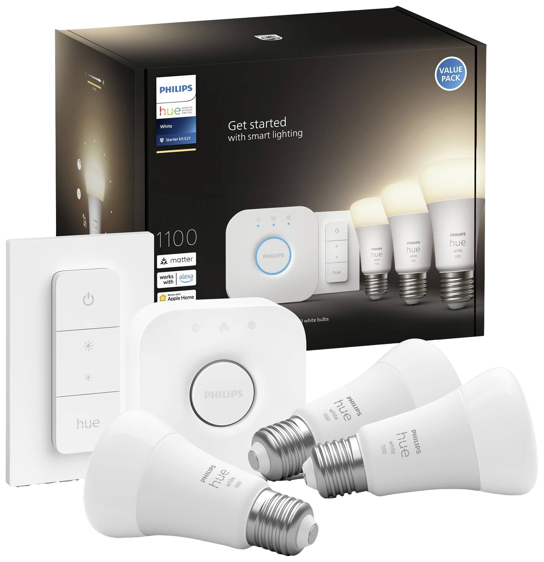 Philips Hue Starter-Kit mit drei smarten LED-Glühbirnen, einem Dimmer-Schalter und Bridge. Verpackung im Hintergrund zeigt Anwendungsmöglichkeiten.