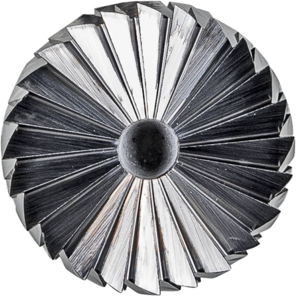 Ein von oben betrachtetes kreisförmiges Metallstück mit radialen, scharfkantigen Mustern, die an die Flügel eines Turbinenschaufelrads erinnern.