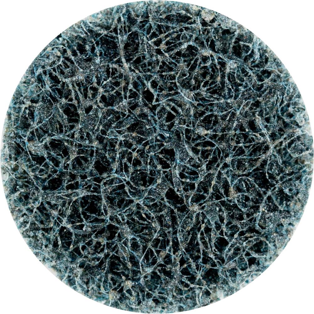 Ein kreisförmiger Metallwolle-Schwamm mit dunkelblauen und schwarzen Fasern, der für die Reinigung von Oberflächen verwendet wird.