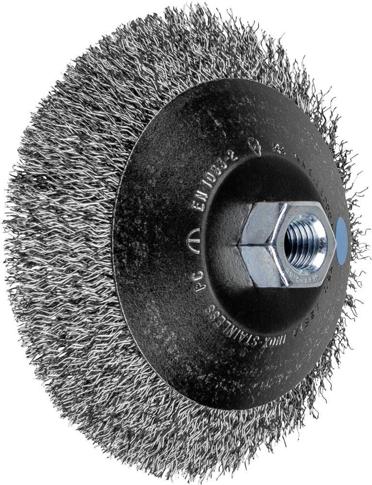 Runde Drahtbürste mit Metallborsten und sechseckiger Befestigungsmutter in der Mitte, verwendet für die Reinigung und Vorbereitung von Oberflächen.