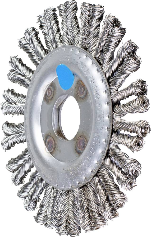 Metallbürstenscheibe mit gedrehten Borsten und einem zentralen Loch in der Mitte, verwendet zur Reinigung oder Oberflächenbearbeitung.