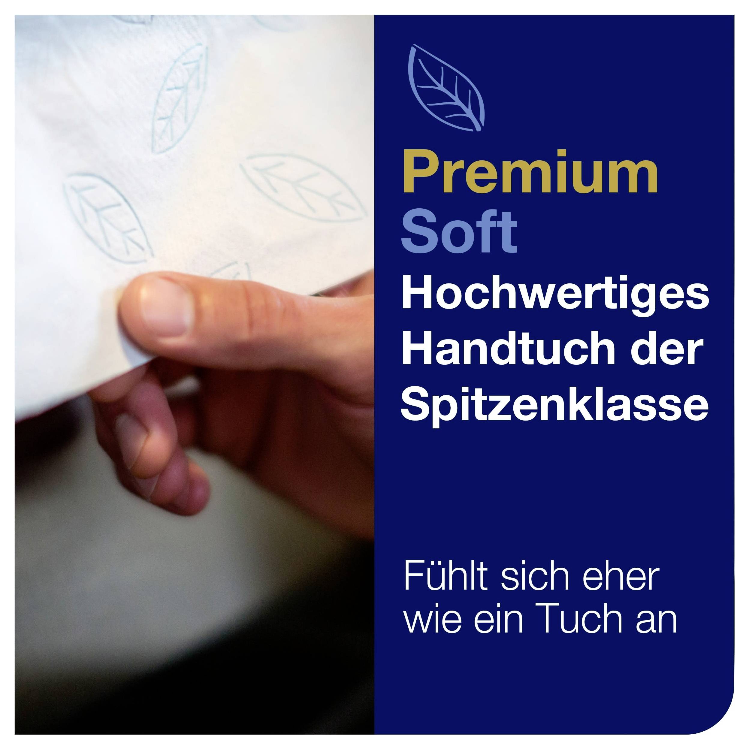 Werbung für Premium Soft-Handtuch: Hand hält weiches Tuch mit Blattmuster; Text 'Hochwertiges Handtuch der Spitzenklasse' und 'Fühlt sich eher wie ein Tuch an'.
