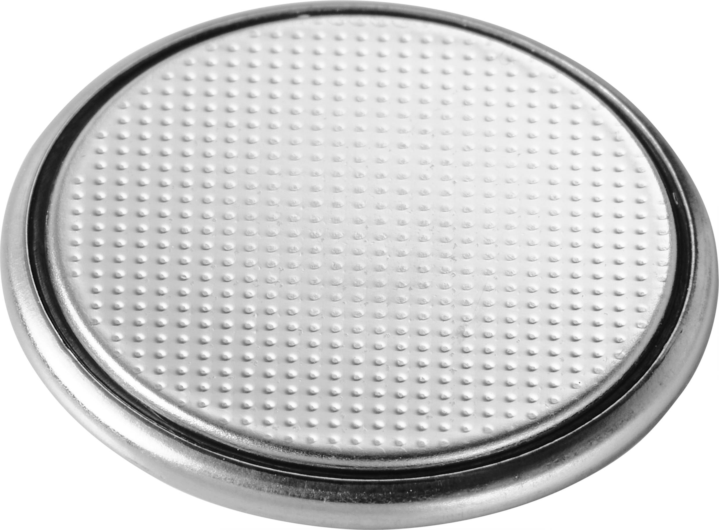 Eine silberne Knopfzellen-Batterie mit gepunkteter Oberfläche.