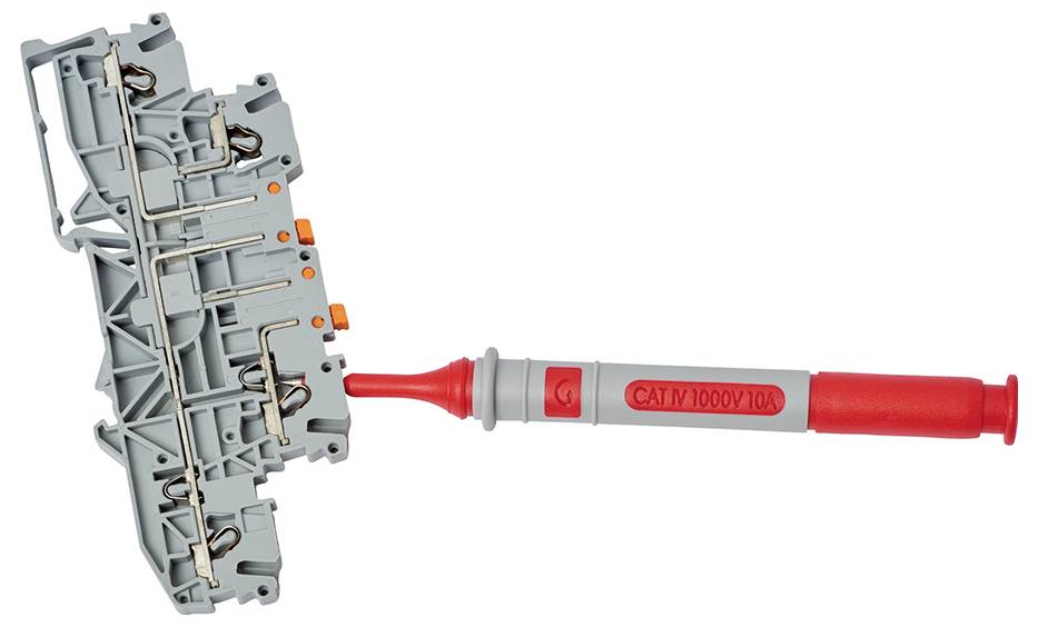 Ein graues elektrisches Anschlussklemmenmodul mit einem roten Spannungsprüfer (CAT IV 1000V) daran angeschlossen.