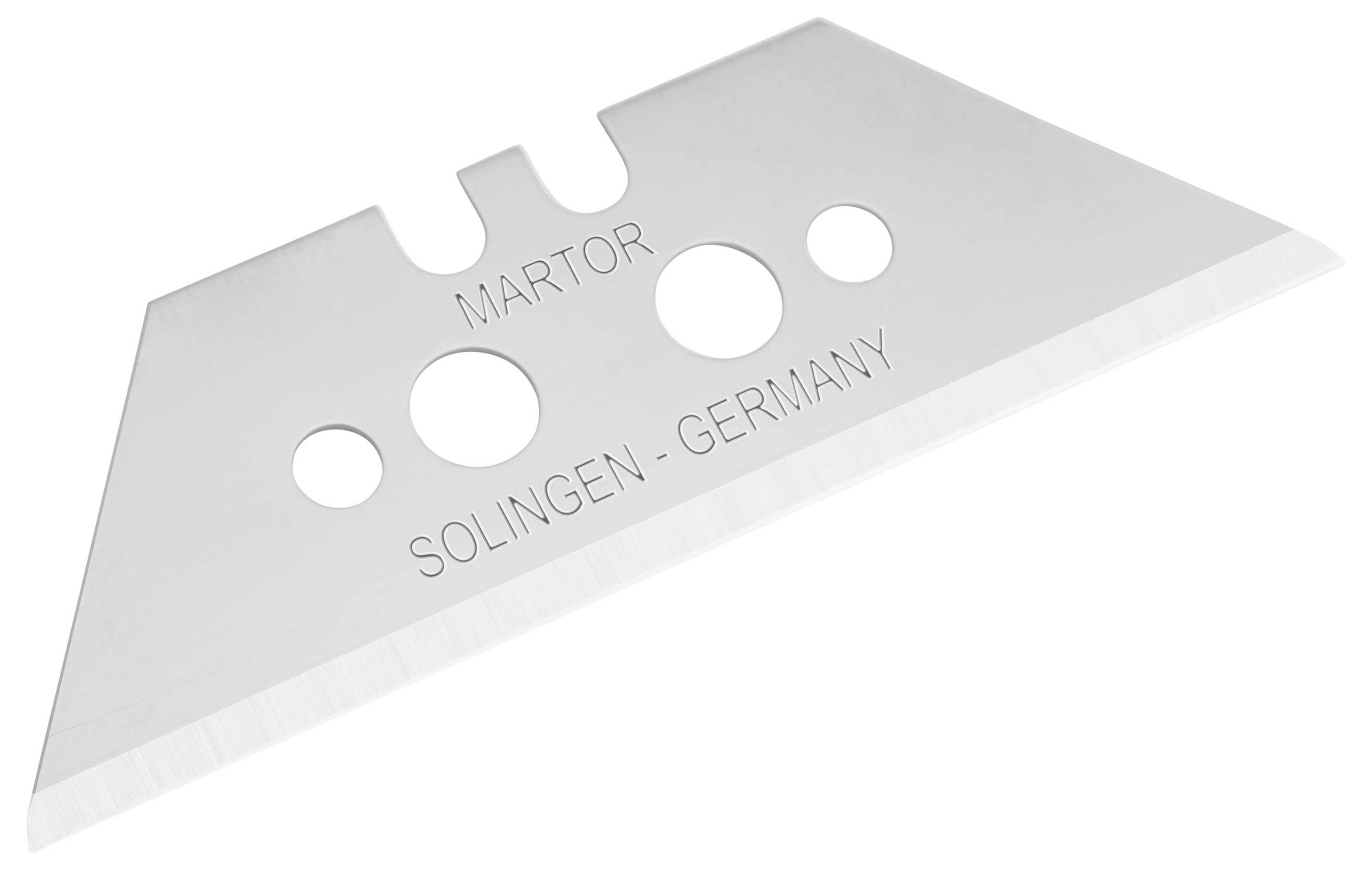 Ein silbernes Trapezklingenmesser mit vier Ausschnitten und der Aufschrift 'Martor, Solingen - Germany' auf der Vorderseite.