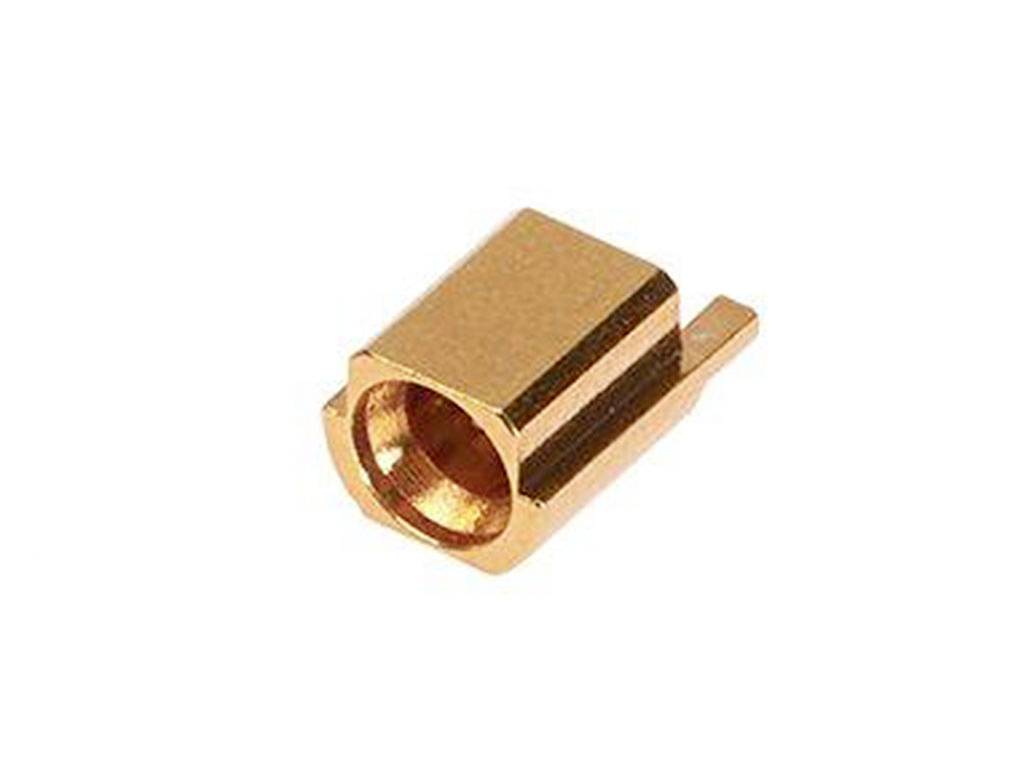 Eine kleine, rechteckige, goldene Metallhülse mit einer zylindrischen Öffnung und einem flachen, seitlichen Vorsprung.