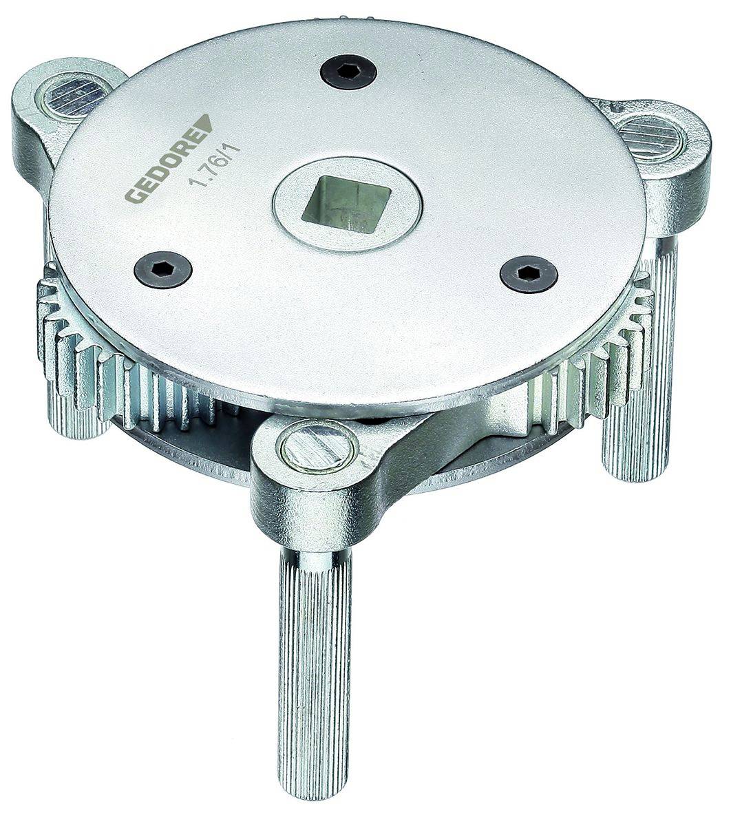 Ein silbernes Zahnradwerkzeug mit der Aufschrift 'GEDORE 1.76/1', sichtbar sind drei Zahnräder und ein quadratisches Loch in der Mitte.