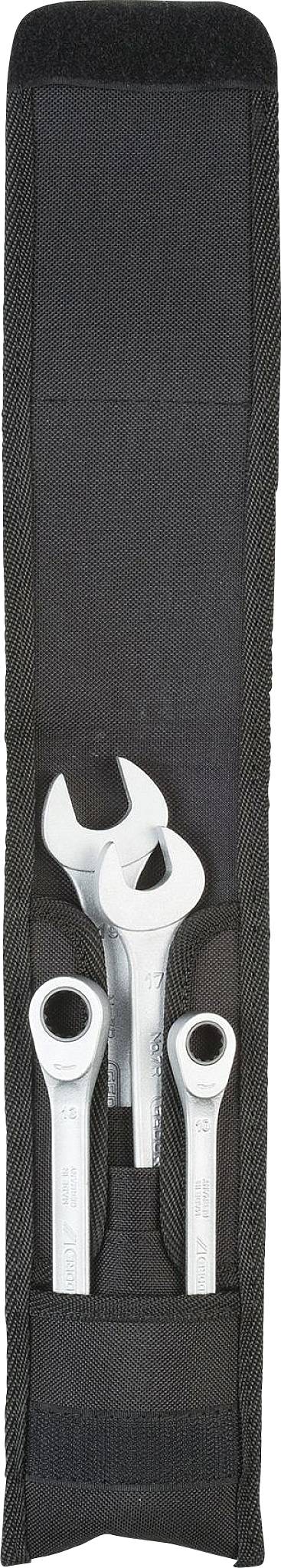 Drei silberne Schraubenschlüssel in einer schwarzen Stofftasche.