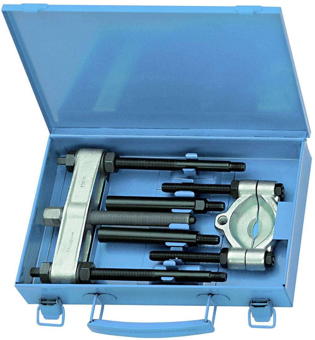 Ein blauer Werkzeugkoffer mit einem Satz Abzieher und Schrauben, die zur Montage oder Demontage von Maschinenteilen verwendet werden.