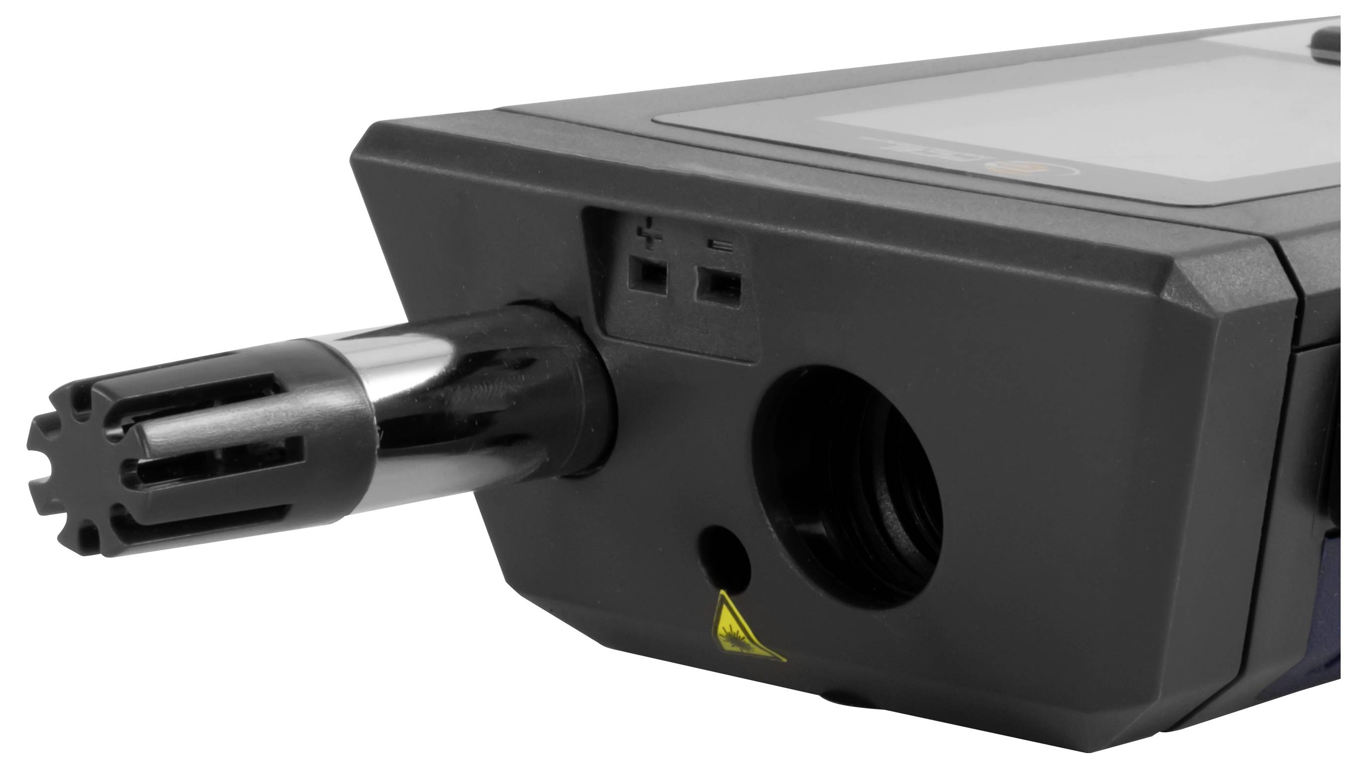 Nahaufnahme eines schwarzen elektronischen Geräts mit einer vorstehenden zylindrischen Sensorvorrichtung oder düsenähnlichem Aufsatz und einem Warnsymbol auf der Frontplatte.